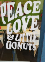 Peace, Love And Little Donuts Of Worthington logo