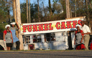 Neighbors Helping Neighbors Kitchen Inc. Now Known As Poobie’s Kwik Stop outside