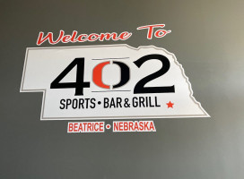 402 Sports And Grill logo